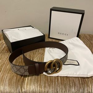 Gucci Belt - Leather-trimmed printed coated-canvas belt
Gold color GG Buckle